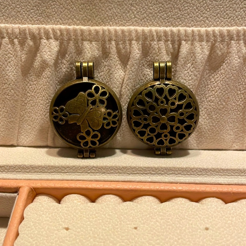 Two (2) Essential oil lockets